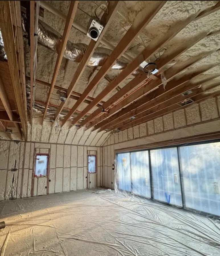 Interior walls and ceiling insulated with spray foam during new construction in Neshannock
